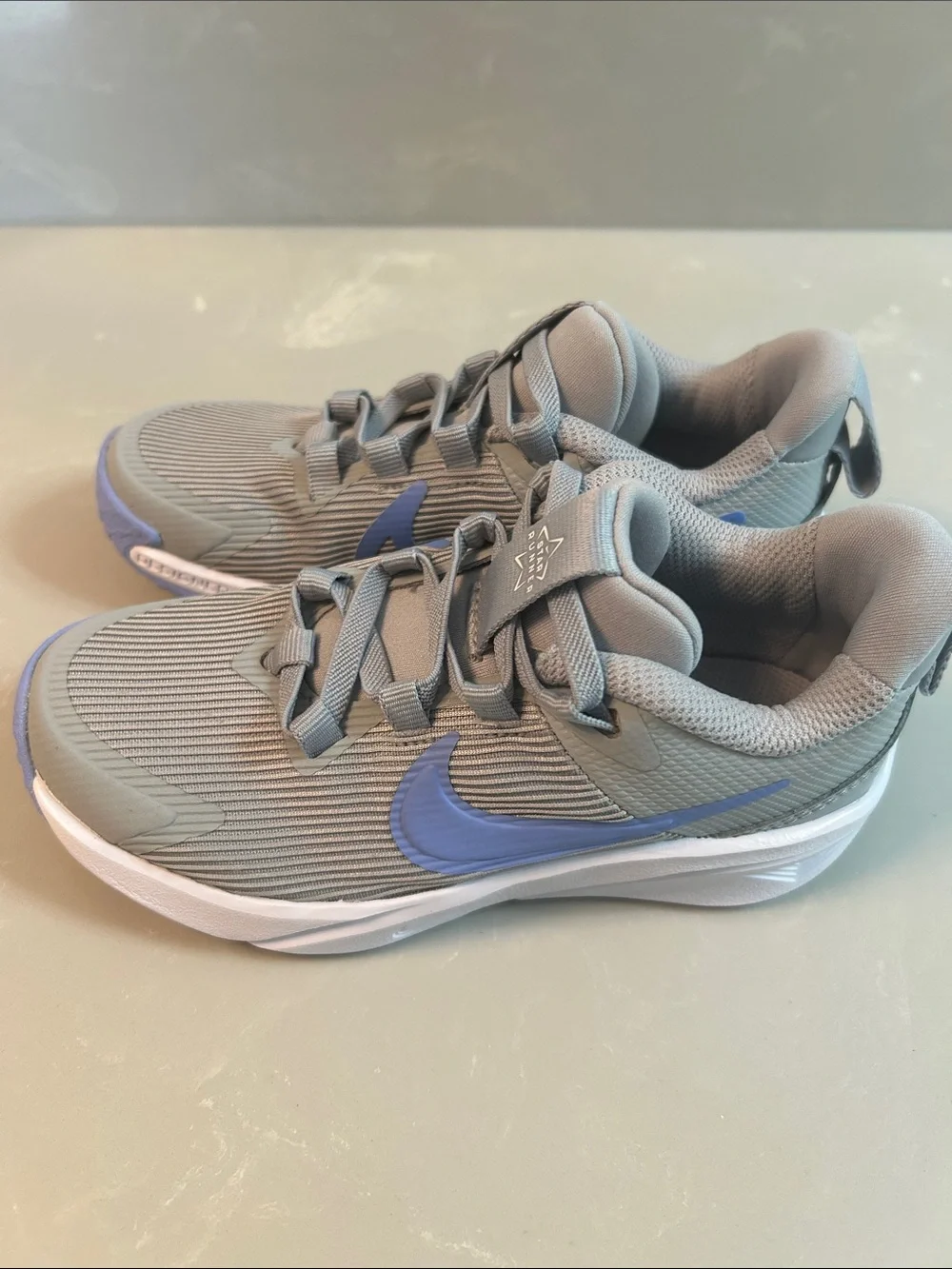 Nike Kids Grey Sneakers with Blue Swoosh